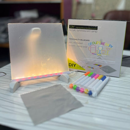LED Light-Up Transparent Writing Board With 7 Marker | 15×15 cm Acrylic Pad with Stand | Colorful DIY Notes & Erasable Pens Rs 736